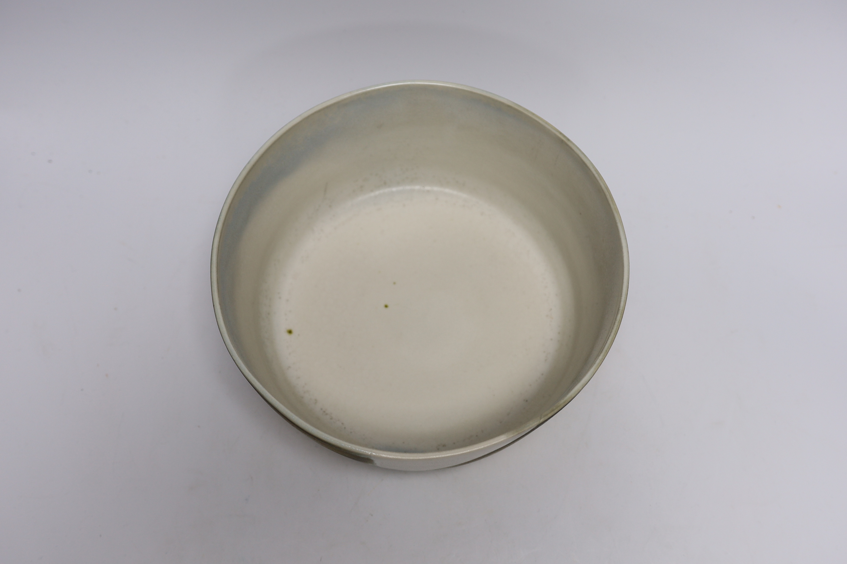 A large Kellie Miller porcelain bowl, signed to base, 25cm diameter